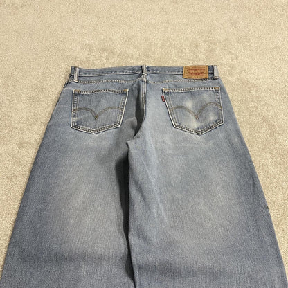 Levi's 560 baggy comfort fit jeans y2k blue Loose wide leg denim pants red tab logo