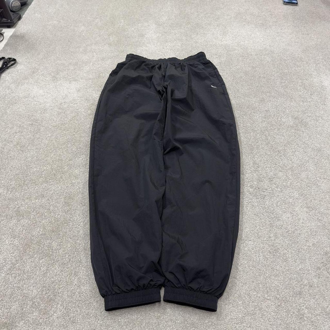 Nike Y2K tracksuit bottoms black Loose floaty mesh lined swoosh logo track pants
