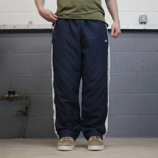 Baggy Reebok tracksuit bottoms vintage wide leg navy Loose embroidered side stripe track pants