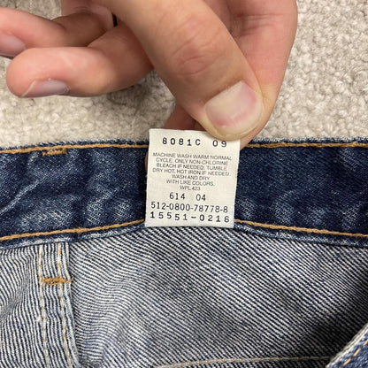 Y2K vintage Levi’s 550 jeans W26L31 blue Relaxed fit tapered leg 5 pocket pants red tab logo