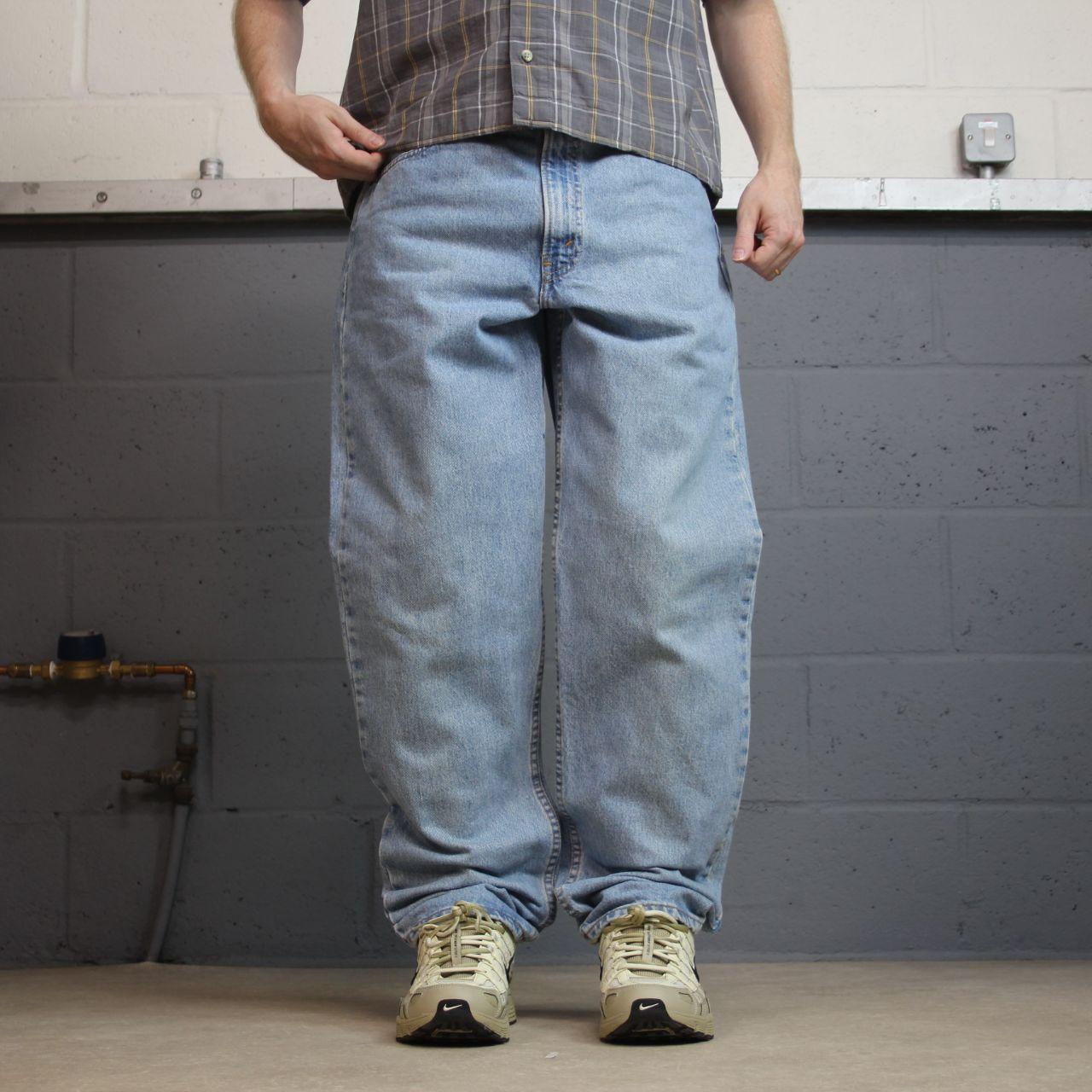 Vintage Levi’s baggy jeans y2k W34L32 washed blue Levi’s 550 relaxed fit surf style pants red tab