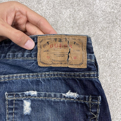 Y2K Guess bootcut jeans W33L34 blue ripped denim Loose bootcut pants with stitch design and pockets