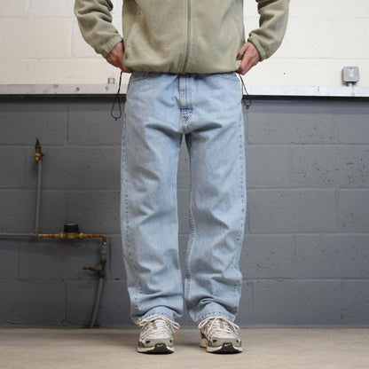 Vintage Y2K Levi’s 505 jeans light wash blue Straight leg 00s style denim pants red tab logo