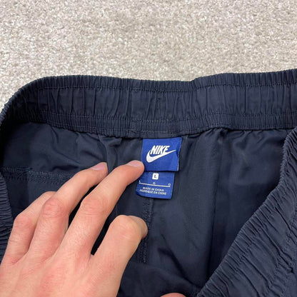 Y2k Nike tracksuit bottoms loose navy Loose unlined embroidered cuffed track pants