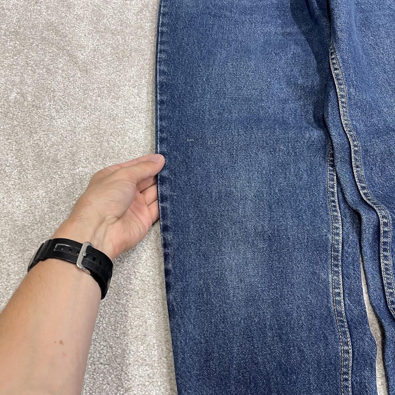 Y2K vintage Levi’s 550 jeans W26L31 blue Relaxed fit tapered leg 5 pocket pants red tab logo