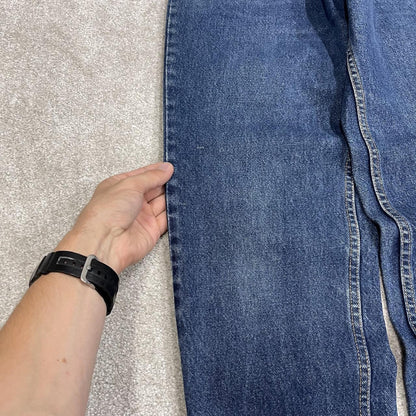 Y2K vintage Levi’s 550 jeans W26L31 blue Relaxed fit tapered leg 5 pocket pants red tab logo