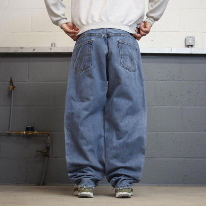 Y2K baggy Levi’s 550 jeans wide leg blue Loose relaxed fit denim pants red tab logo