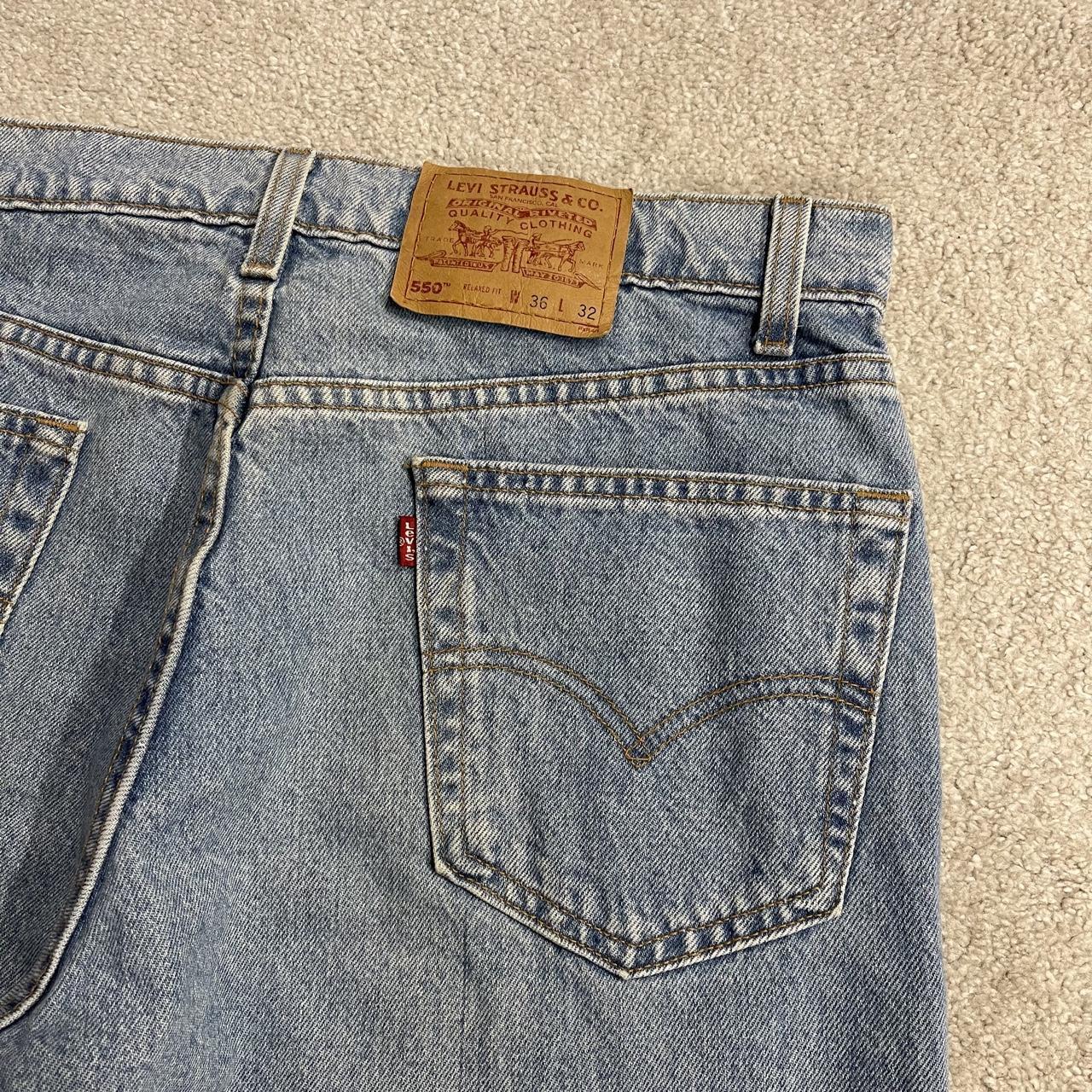 Vintage Levi’s baggy jeans y2k W34L32 washed blue Levi’s 550 relaxed fit surf style pants red tab