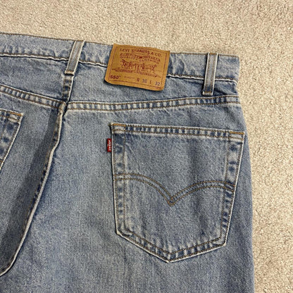 Vintage Levi’s baggy jeans y2k W34L32 washed blue Levi’s 550 relaxed fit surf style pants red tab