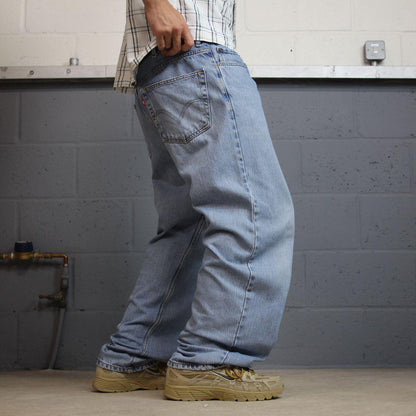 Levi’s 550 baggy jeans y2k W36L34 blue relaxed fit surf style pants red tab logo
