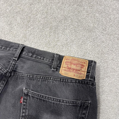 Levi’s 550 jeans Y2K relaxed fit denim faded black Levi’s loose leg 2000s style pants red tab logo