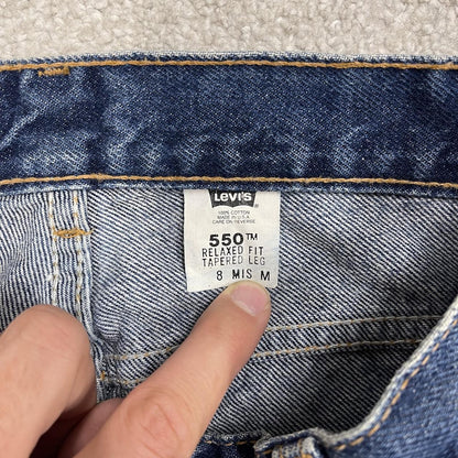 Y2K vintage Levi’s 550 jeans W26L31 blue Relaxed fit tapered leg 5 pocket pants red tab logo