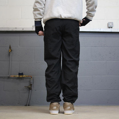 Black Nike trackies S 6-8 loose y2k floaty leg joggers embroidered logo