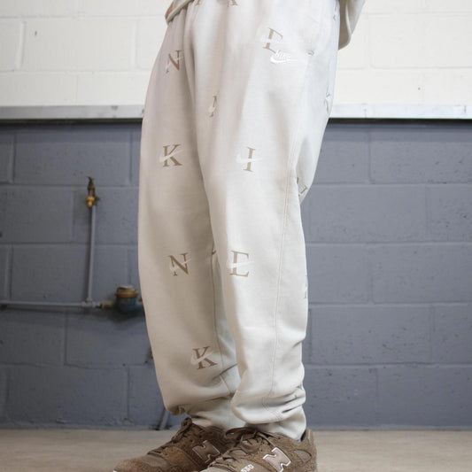 Y2k beige Nike joggers XL loose sweatpants cuffed legs embroidered logo