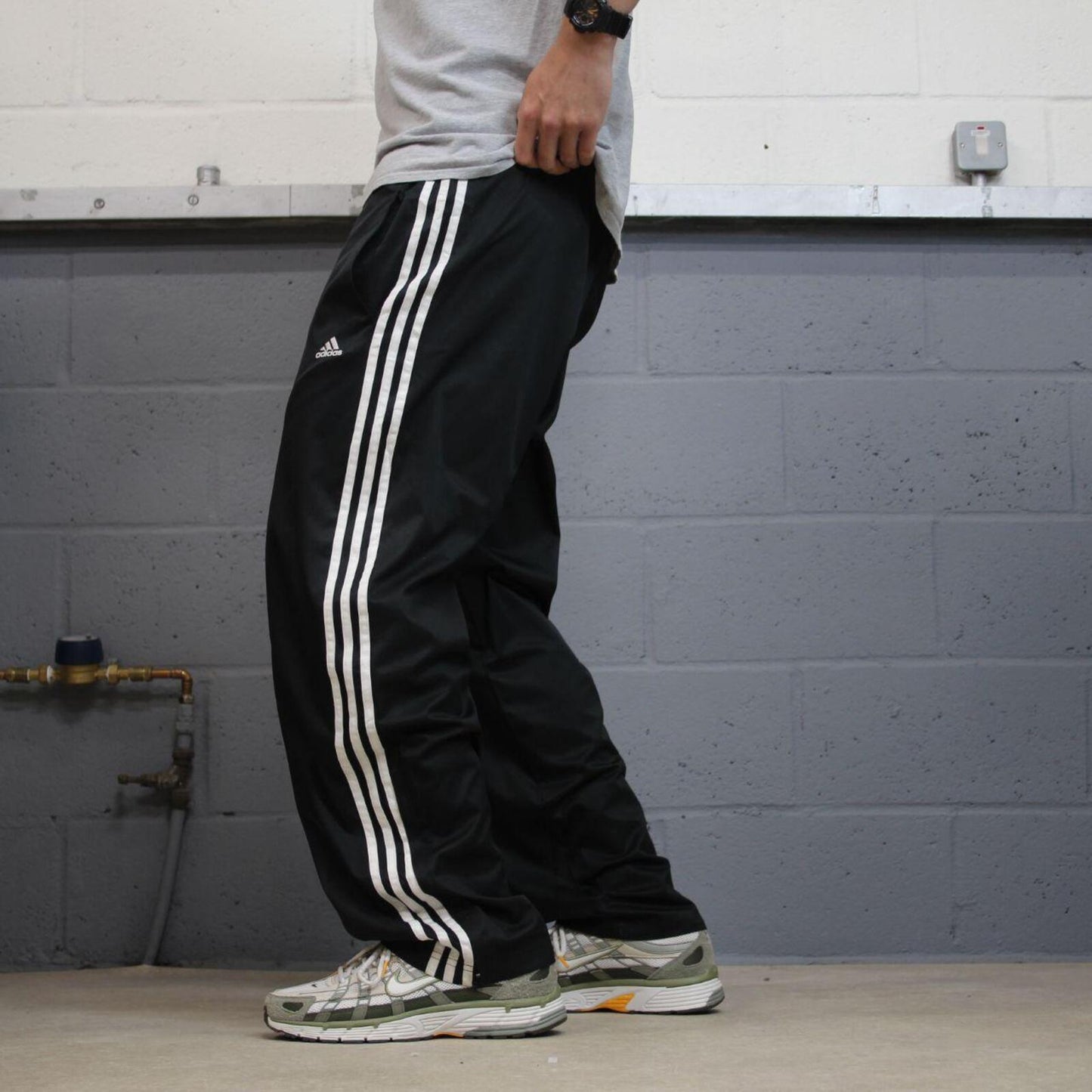 Adidas tracksuit bottoms loose black Loose floaty leg embroidered side stripe track pants