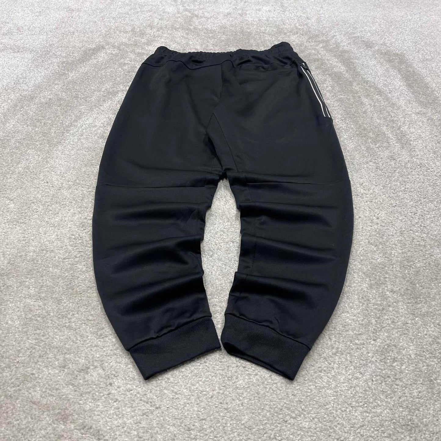 Black Nike tracksuit bottoms Medium y2k style sportswear track pants cuffed embroidered