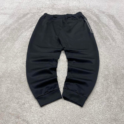 Black Nike tracksuit bottoms Medium y2k style sportswear track pants cuffed embroidered