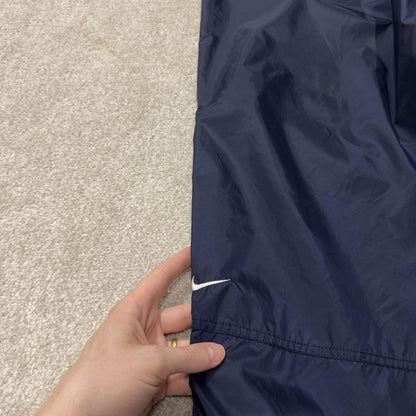 Vintage Nike tracksuit bottoms Y2K navy Loose leg unlined embroidered swoosh track pants