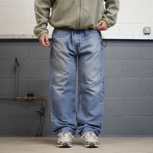 Y2k Levi's 505 jeans straight leg blue denim Loose 90s skater style pants red tab logo