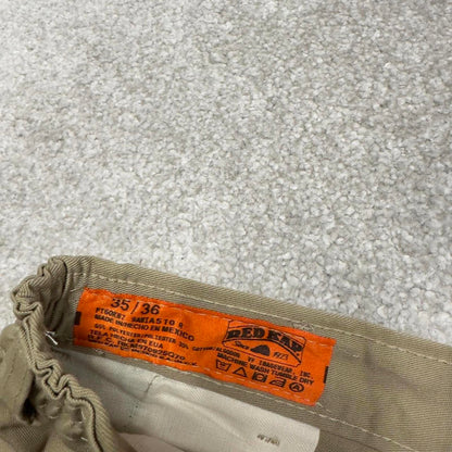 Vintage y2k baggy work pants beige Loose chino style skate trousers Red Kap workwear patch logo