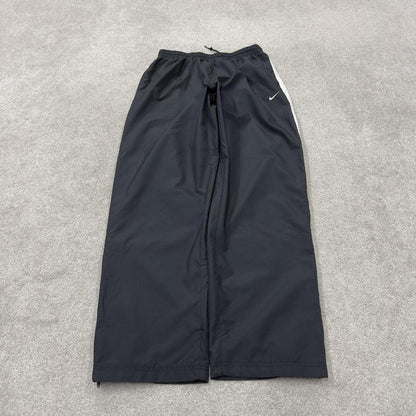 Nike tracksuit bottoms Y2K black Loose fit mesh lined embroidered side stripe track pants
