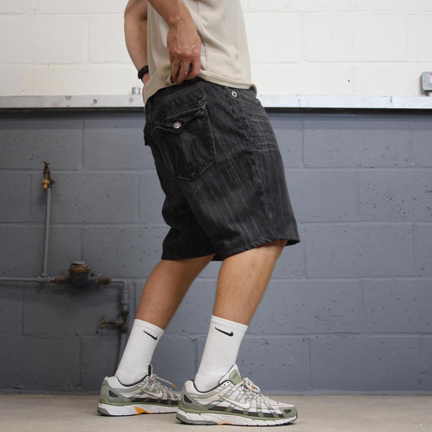 Black embroidered MEK DNM jorts W38