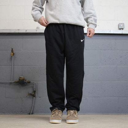 Nike Trackies L black y2k 00s style dri-fit joggers embroidered logo