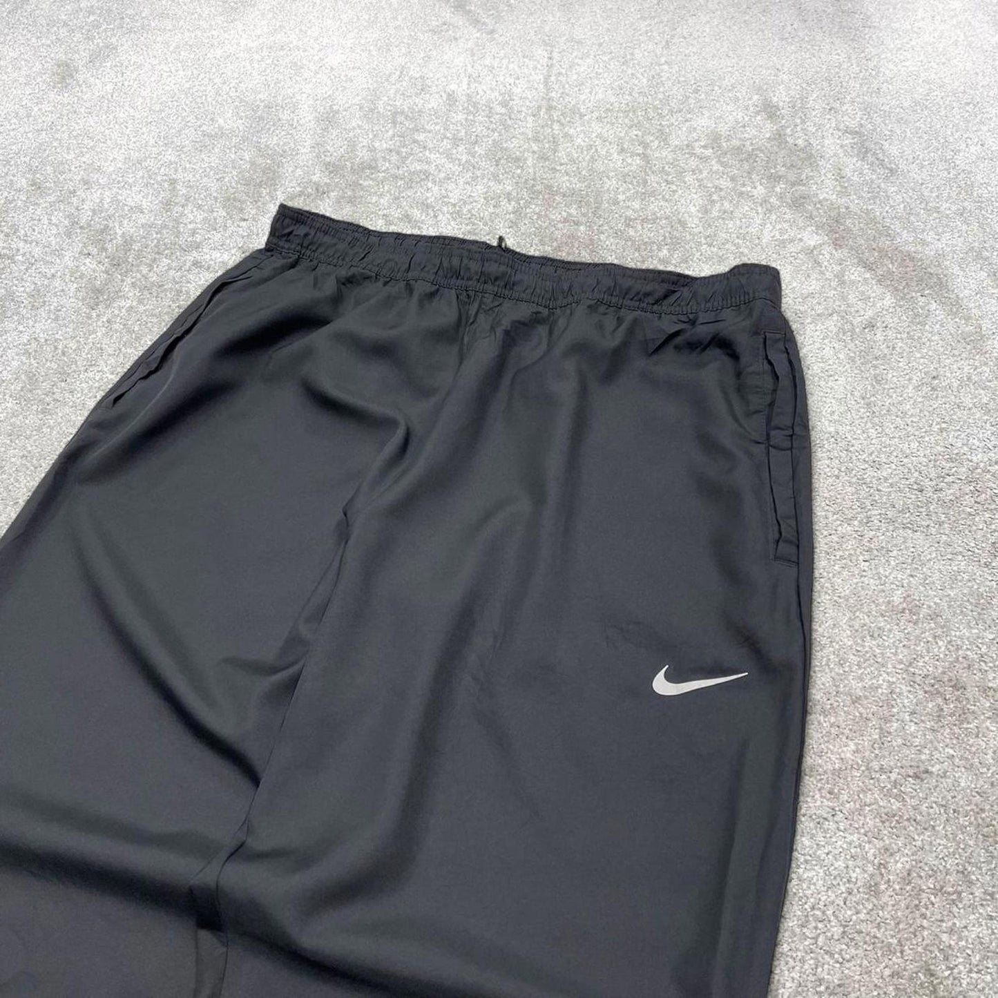 Vintage y2k Nike tracksuit bottoms black Floaty swoosh logo running track pants