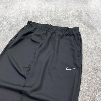 Vintage y2k Nike tracksuit bottoms black Floaty swoosh logo running track pants