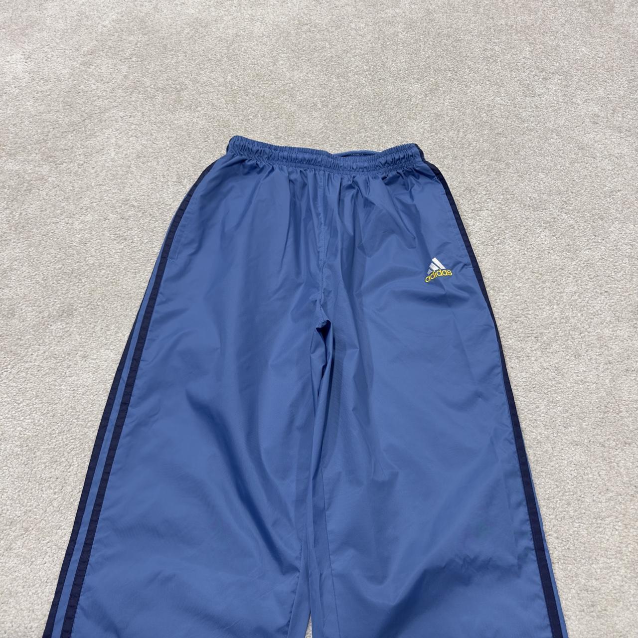 Vintage y2k Adidas tracksuit bottoms blue Loose leg embroidered side stripe 2000s style track pants