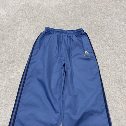 Vintage y2k Adidas tracksuit bottoms blue Loose leg embroidered side stripe 2000s style track pants