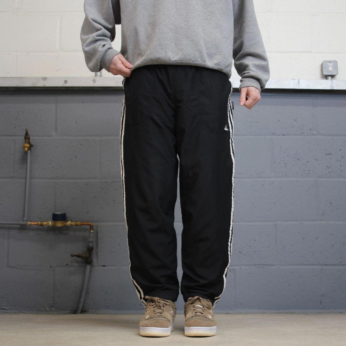 Vintage Y2K Adidas tracksuit bottoms black Loose leg mesh lined side stripe track pants
