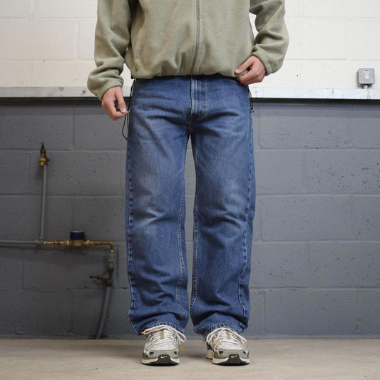 Vintage Y2K Levi’s 505 jeans light wash blue Straight leg 00s style denim pants red tab logo