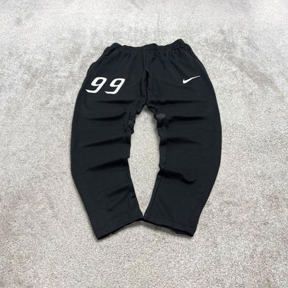 Y2k Nike tracksuit bottoms Small men's black slim joggers casual Dri-Fit gym wear track pants