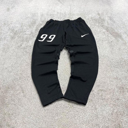 Y2k Nike tracksuit bottoms Small men's black slim joggers casual Dri-Fit gym wear track pants