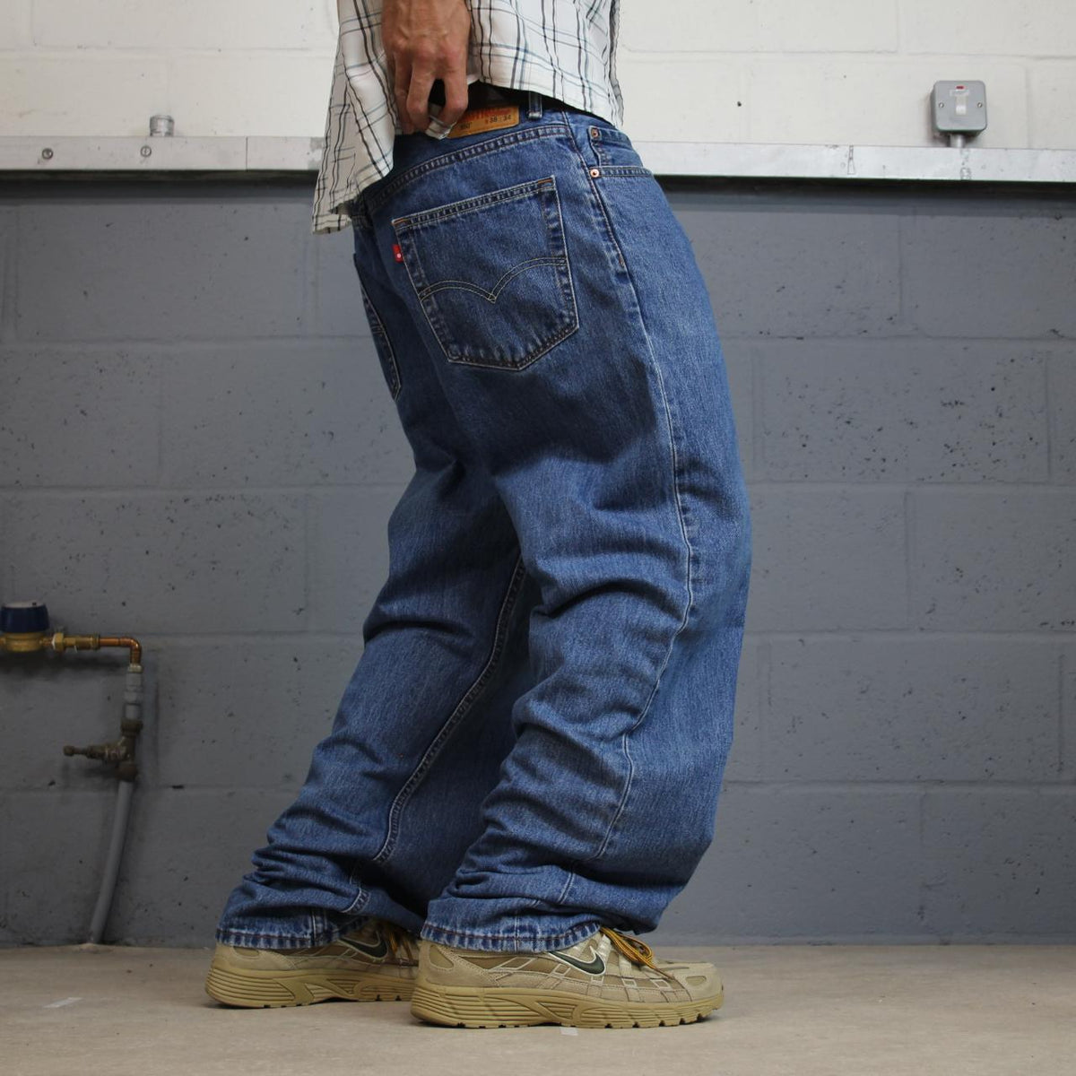 Levi’s 550 jeans Y2K blue denim loose leg 2000s style pants red tab logo
