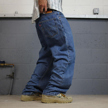 Levi’s 550 jeans Y2K blue denim loose leg 2000s style pants red tab logo