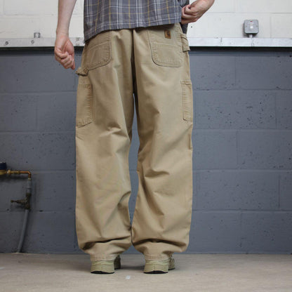 Tan baggy vintage Carhartt carpenter pants y2k Loose leg 2000s skater style workwear