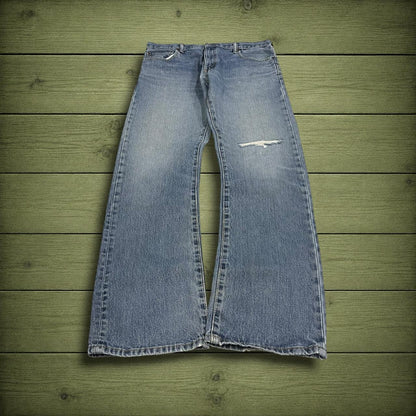 Y2K Levi’s 517 bootcut jeans blue denim Loose bootcut pants with red tab logo