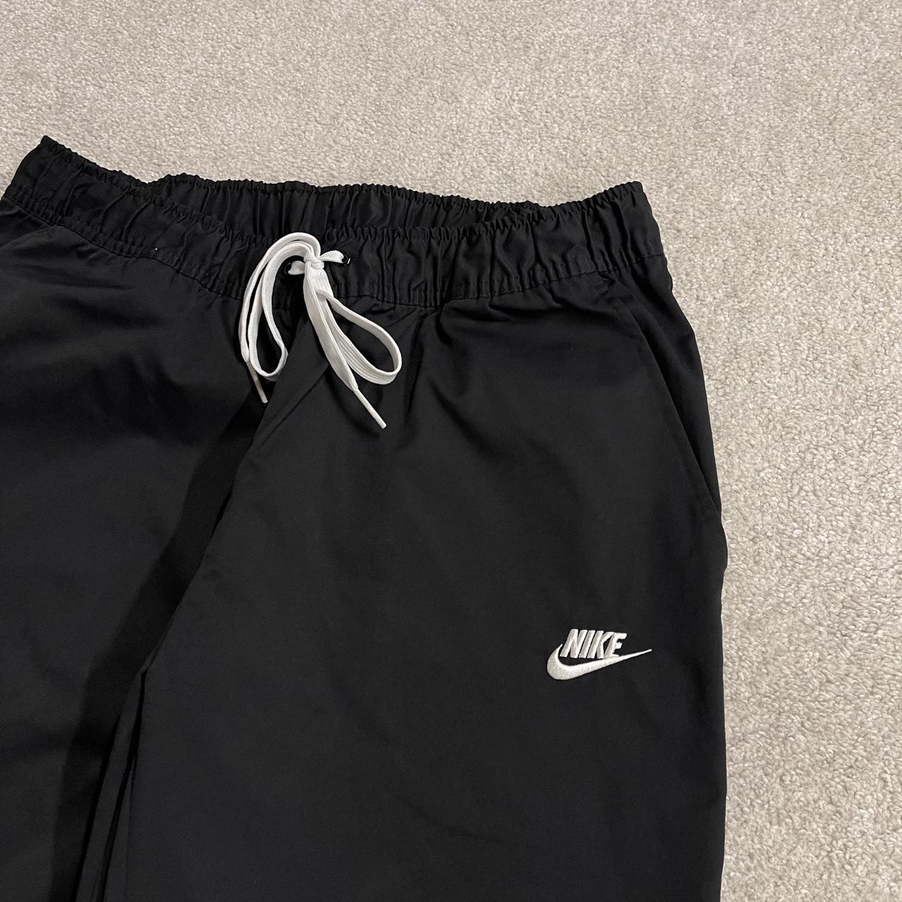 Y2K Nike technical tracksuit bottoms black Ulined track pants with embroidered logo