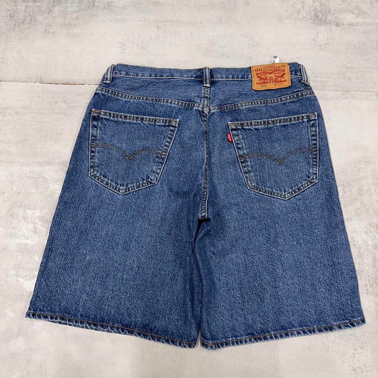 Vintage mens Levi’s 550 jorts W34 blue denim loose 90s style skater shorts