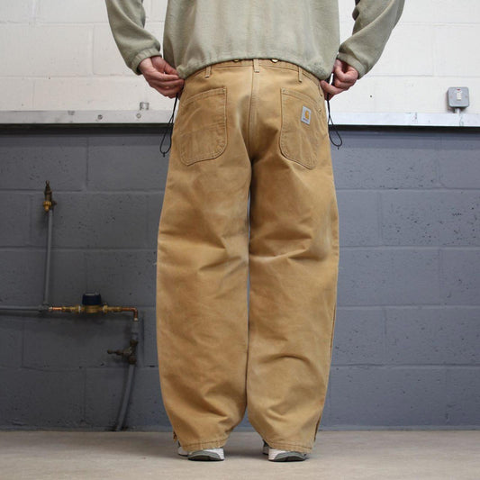 Baggy Carhartt quilt lined jeans tan brown W40L30 vintage 90s skater style canvas cargos