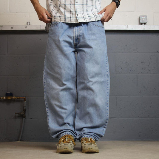 Levi’s 550 baggy jeans y2k W36L34 blue relaxed fit surf style pants red tab logo
