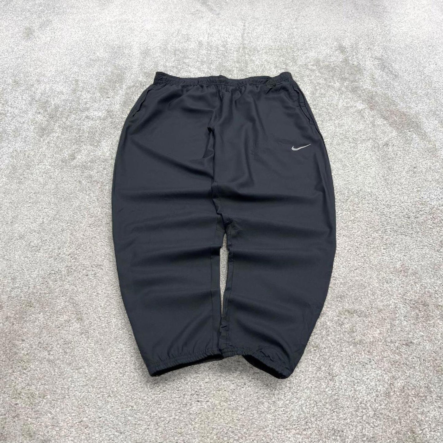 Vintage y2k Nike tracksuit bottoms black Floaty swoosh logo running track pants