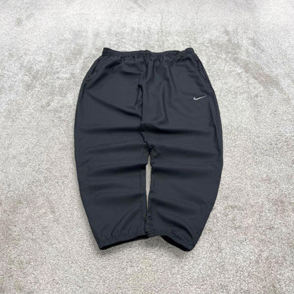 Vintage y2k Nike tracksuit bottoms black Floaty swoosh logo running track pants