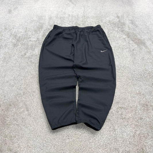 Vintage y2k Nike tracksuit bottoms black Floaty swoosh logo running track pants