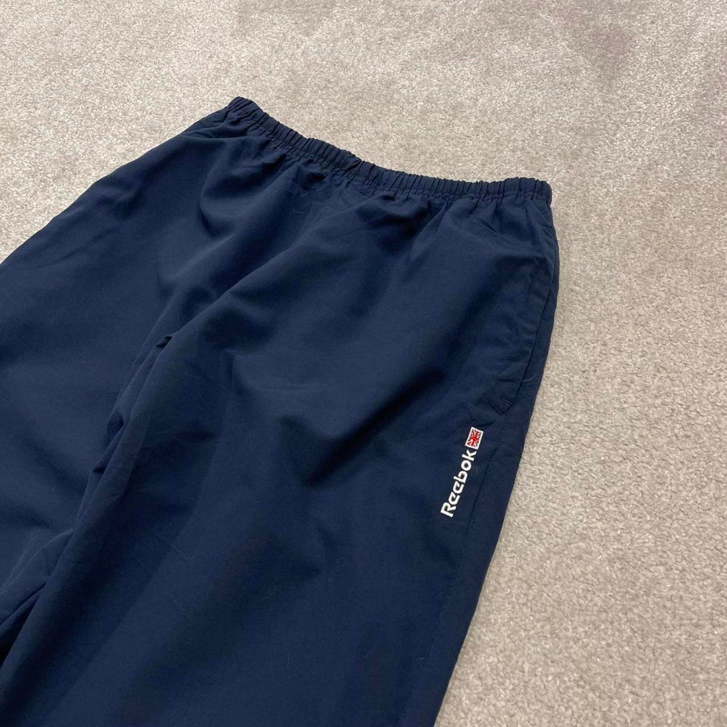 Vintage y2k Reebok tracksuit bottoms navy Loose lined embroidered track pants ankle zips