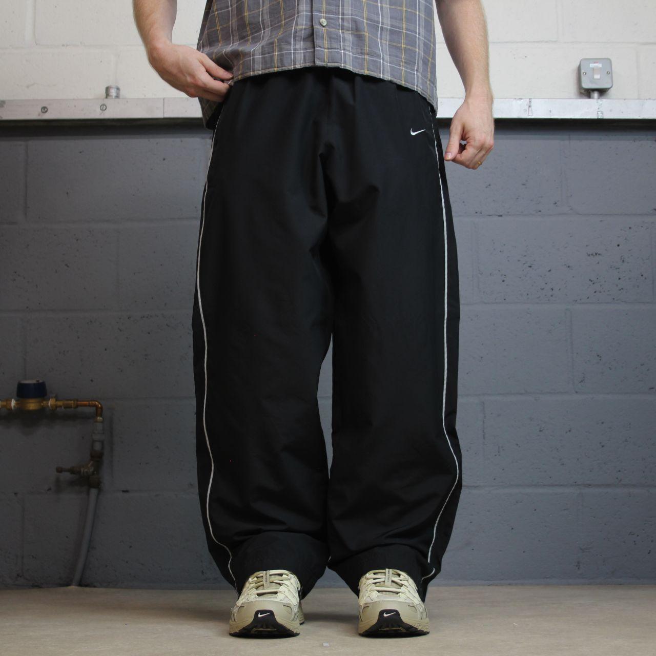 Vintage Nike baggy tracksuit bottoms black wide leg L swoosh logo track pants