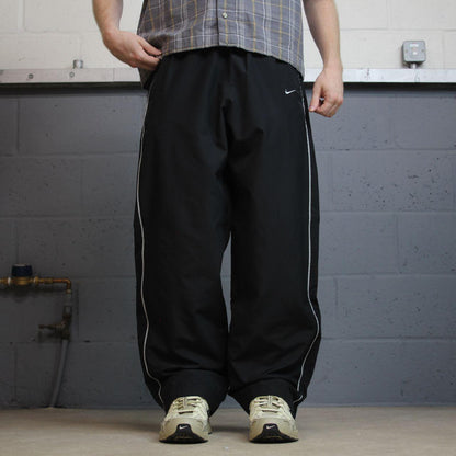 Vintage Nike baggy tracksuit bottoms black wide leg L swoosh logo track pants
