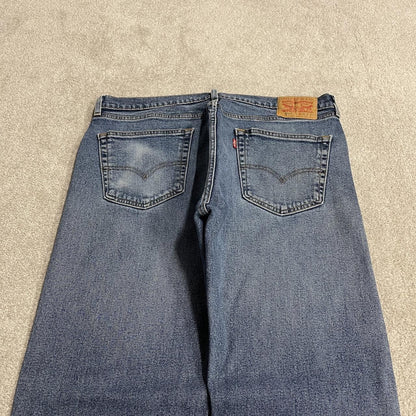 Y2K Levi’s 505 jeans W36L30 blue Straight fit 5 pocket belt loops red tab logo
